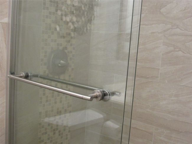 Bathroom featuring a shower stall | Image 17