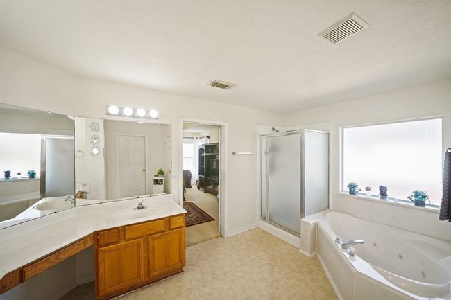 13823 Eldridge Garden Cir, House other with 4 bedrooms, 3 bathrooms and 2 parking in Houston TX | Image 23