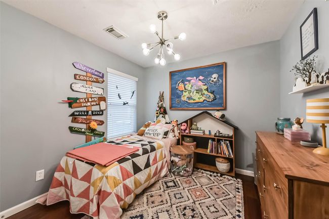 Secondary bedroom adjacent to bathroom. | Image 6