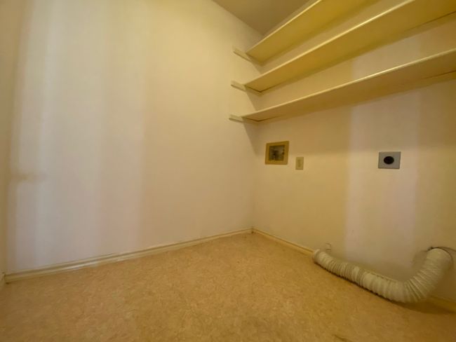 Laundry room featuring electric dryer hookup, hookup for a washing machine, and carpet floors | Image 15