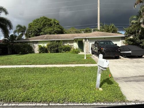 203 Canterbury Dr W, Riviera Beach, FL, 33407-1305 | Card Image