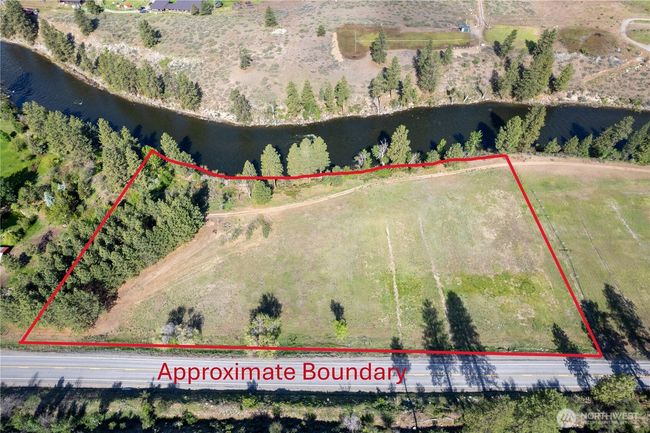Easy access, plenty of usable land, and riverfront make this property the perfect home. | Image 11