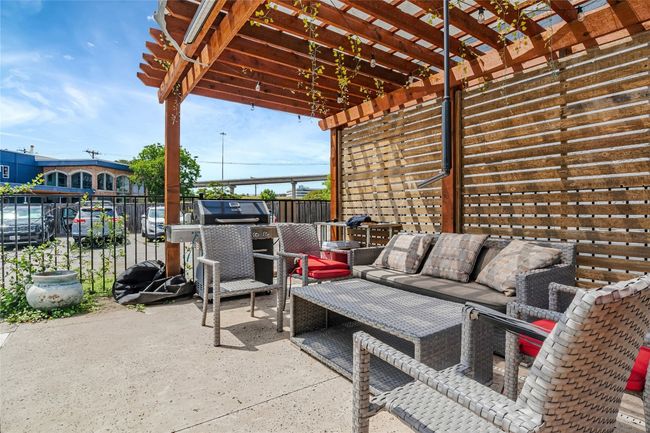 View of patio / terrace featuring a pergola and an outdoor living space by pool | Image 17