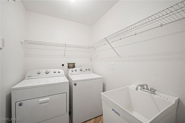 Washroom featuring washing machine and dryer | Image 25