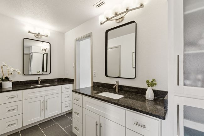 Primary bath features double vanities | Image 15