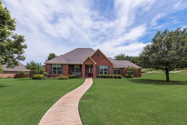 View of front of property with brick siding and roof with shingles | Image 5