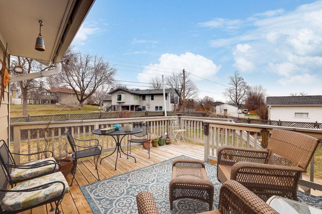 Large raised deck off kitchen eating area | Image 28