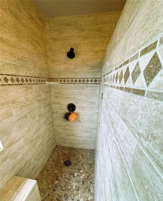 Primary Bathroom with walk-in tiled shower. | Image 27