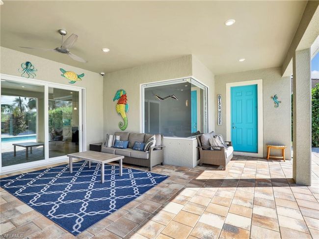 View of patio / terrace featuring outdoor lounge area and ceiling fan | Image 37