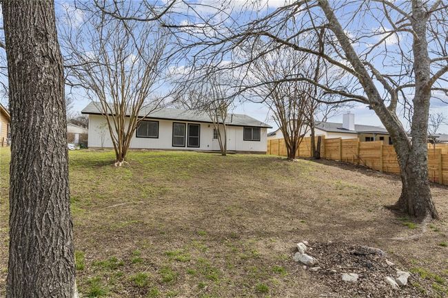 Big back yard with lots of trees. | Image 21