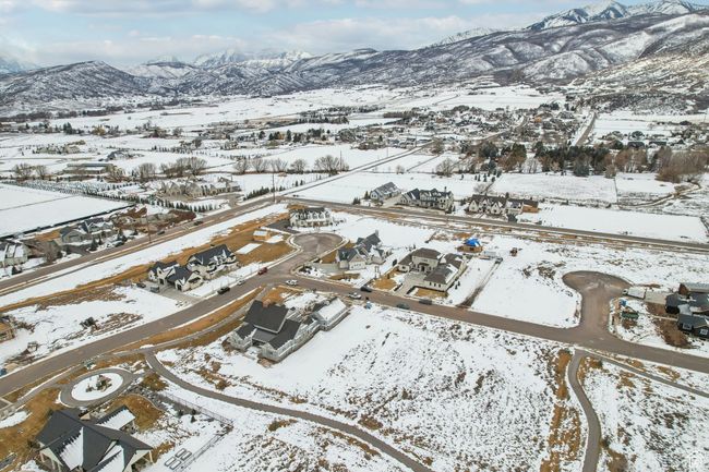 Snowy aerial view with a residential view and a mountain view | Image 61