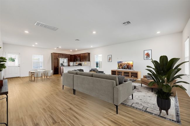 Living room featuring recessed lighting and light wood-type flooring | Image 7