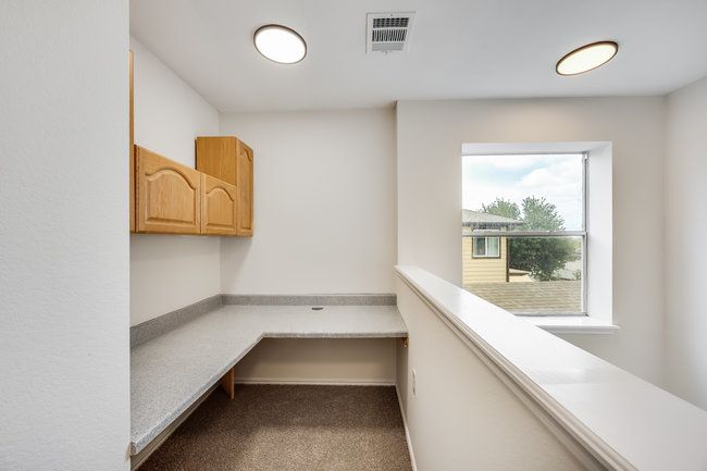 Unfurnished office featuring carpet flooring and baseboards | Image 22