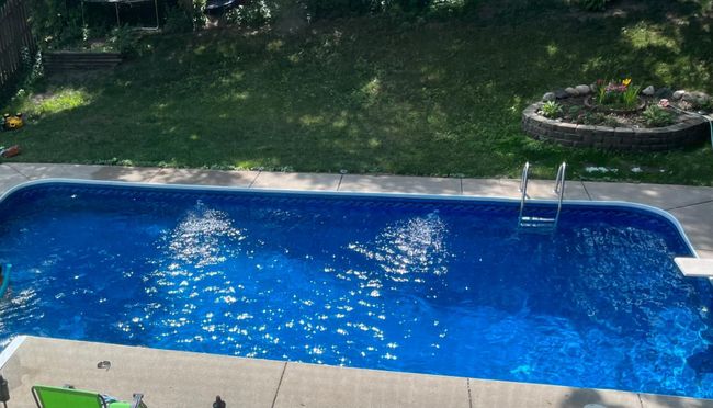 19' X 33' Swimming Pool in the summer | Image 22