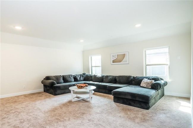 Carpeted living area featuring recessed lighting | Image 19