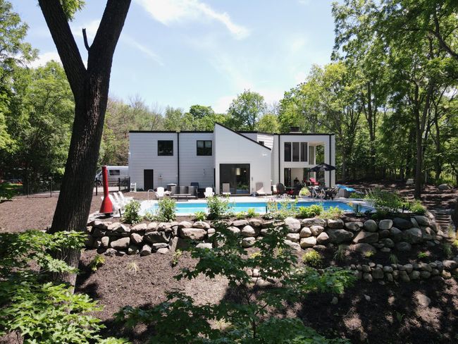 Landscaping created an amazing outdoor space and pool area | Image 6