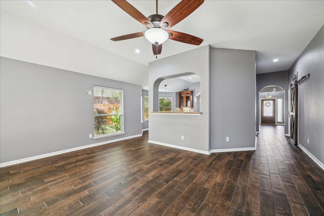 View of the open space to the kitchen area from living room | Image 11