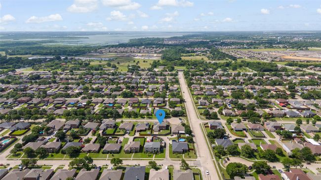 Aerial view of property and surrounding area featuring nearby suburban area | Image 33