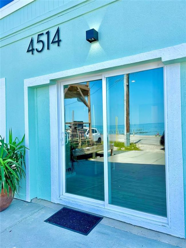 sliding door to entertainment room/bedroom | Image 15