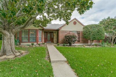 View of front of house featuring a front yard | Image 1