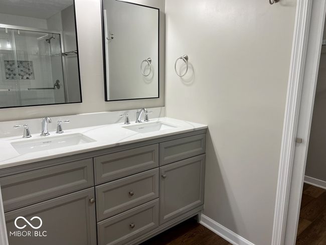 Double vanities plus large walk in closet in Primary suite bathroom | Image 21