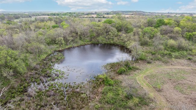 Bird's eye view of a large body of water | Image 8