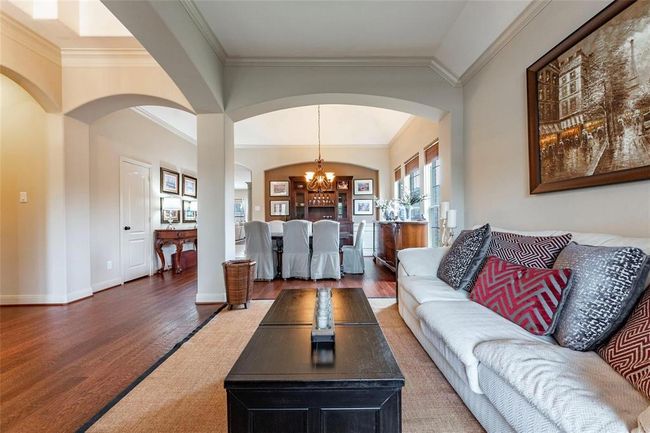 Another view of the living room looking towards the formal dining area. | Image 15