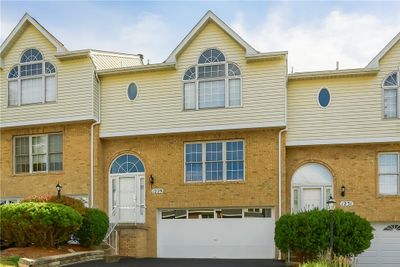 1229 Elm Drive, Townhouse with 3 bedrooms, 2 bathrooms and 2 parking in North Fayette PA | Image 1