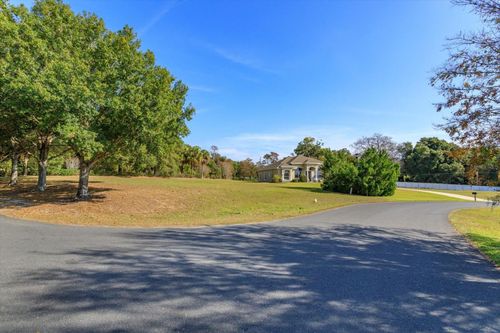 1001 Myrtle Breezes Ct, Fruitland Park, FL, 34731-6547 | Card Image