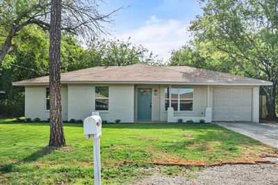 Ranch-style home, fully renovated interior. | Image 1