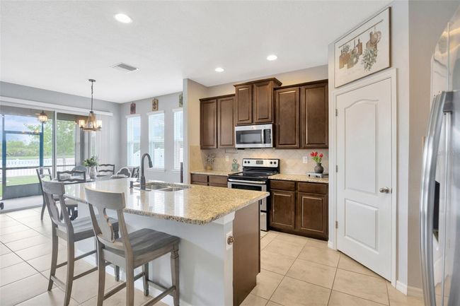 5624 Fisher Glen Loop, House other with 4 bedrooms, 4 bathrooms and null parking in WESLEY CHAPEL FL | Image 20