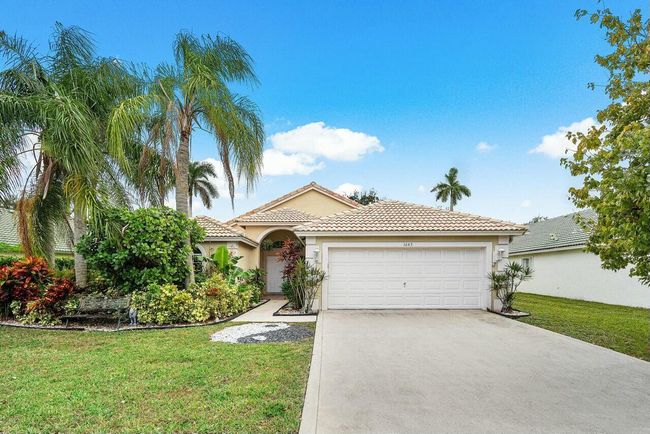 1643 Oak Berry Cir, House other with 3 bedrooms, 2 bathrooms and null parking in Wellington FL | Image 27