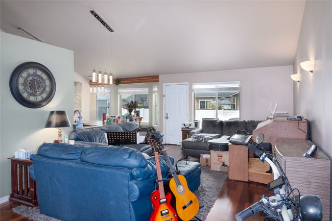 Living room with wood finished floors | Image 37