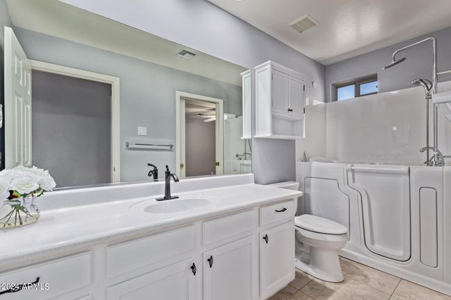 WALK IN JETTED TUB & SHOWER + ENTRANCE TO GUEST BEDROOM | Image 36