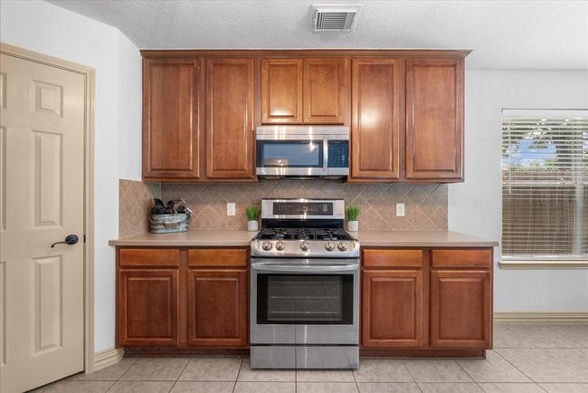 6907 Autumn Rain Ln, House other with 4 bedrooms, 3 bathrooms and 2 parking in Spring TX | Image 12
