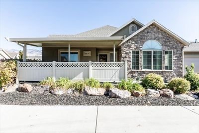 View of front of property with a garage | Image 1