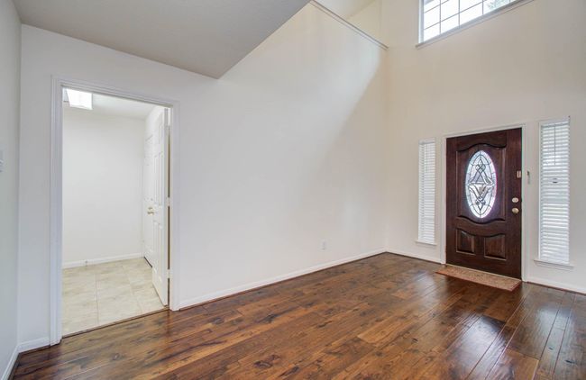The foyer is large enough for a separate sitting area or office space. | Image 7
