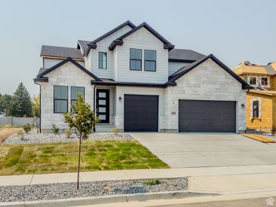 View of front of property with a garage | Image 2