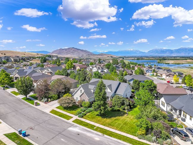 Aerial view of residential area with a water and mountain view | Image 59