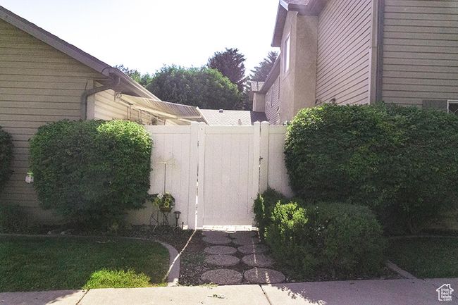 View of property exterior with a garage | Image 34