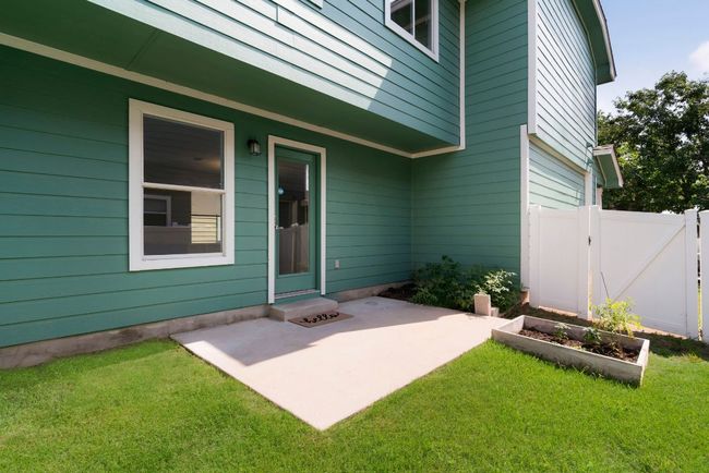 Just off the main living area is a patio area combining indoor and outdoor living. enhanced to show seasonality and potential. | Image 27