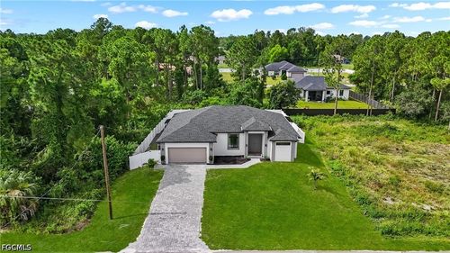 2711 18th St W, Lehigh Acres, FL, 33971-4588 | Card Image