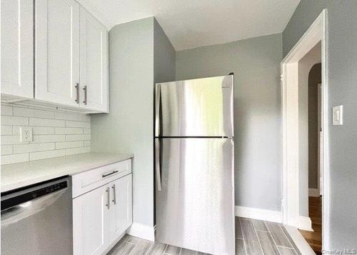 upper-73-23 220th Street, New York, NY, 11364 | Card Image