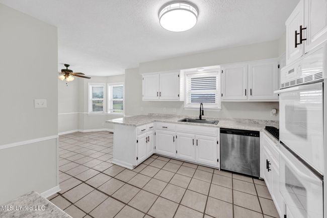 Renovated Kitchen with Double Ovens | Image 10