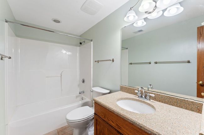 9946 Wellington Ln, Townhouse with 4 bedrooms, 3 bathrooms and null parking in Woodbury MN | Image 36