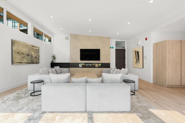 Living room featuring baseboards, visible vents, recessed lighting, and light wood-type flooring | Image 27