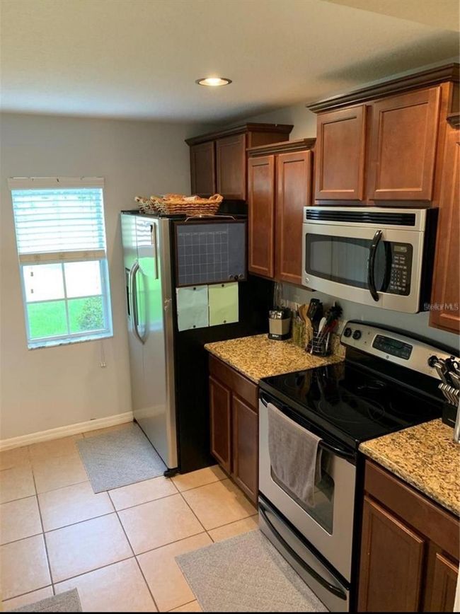 9871 Trumpet Vine Loop, Townhouse with 3 bedrooms, 3 bathrooms and null parking in TRINITY FL | Image 5