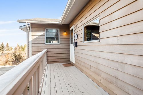 1051 Woodbridge Dr, Helena, MT, 59601-5477 | Card Image