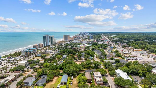 View of urban area with a nearby body of water | Image 13