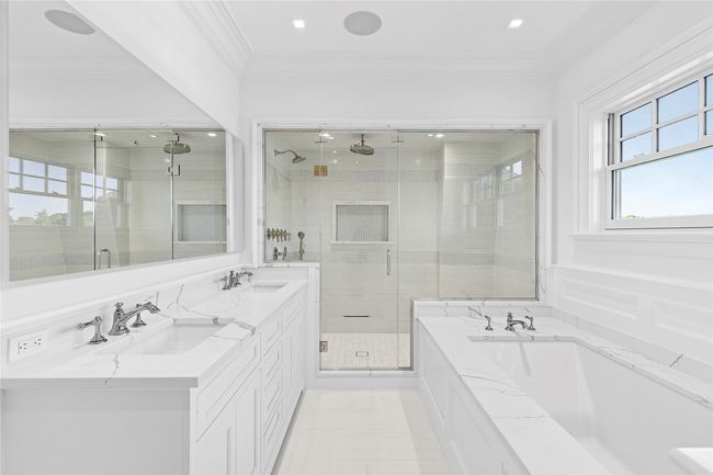 Full bath with toilet and a marble finish shower | Image 37